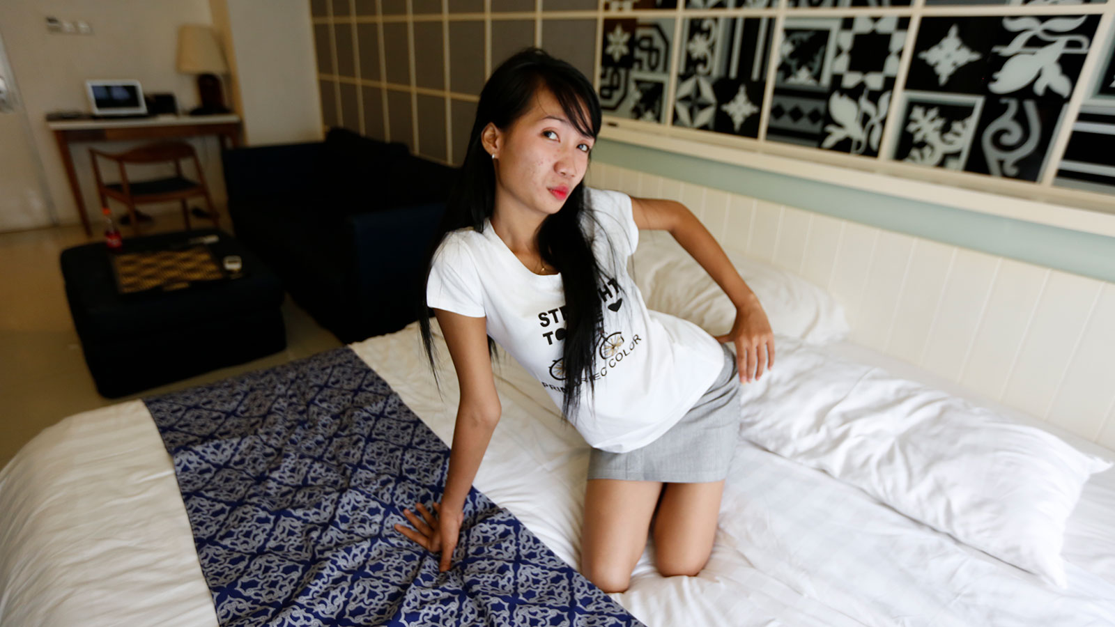 Skinny Body Asian in short skirt